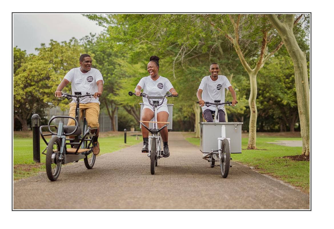 A Hendrikse rider with an electric cargo bike in Stellenbosch